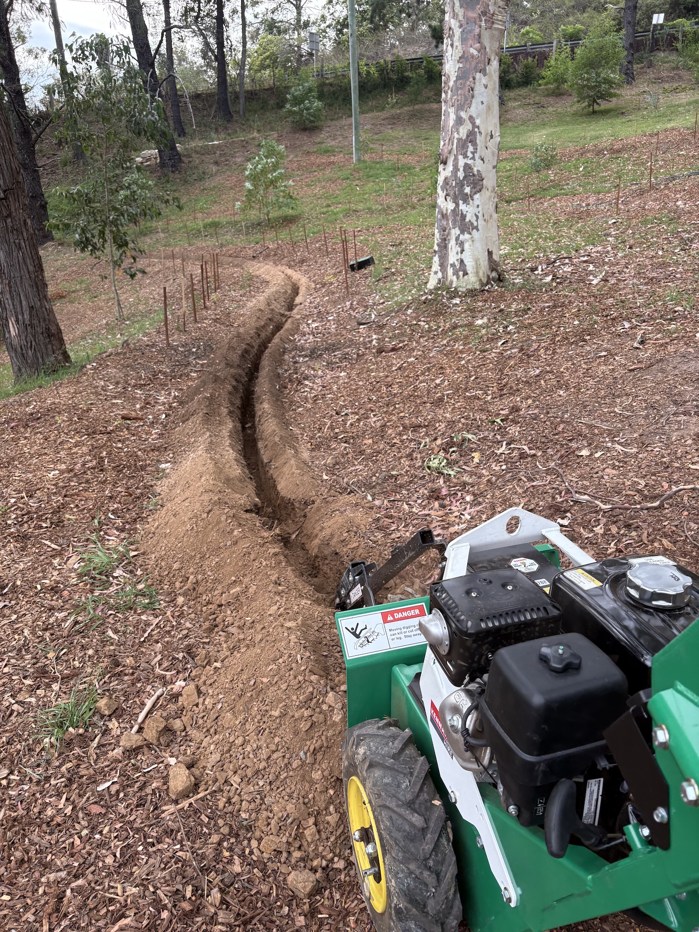 machine creating a trench